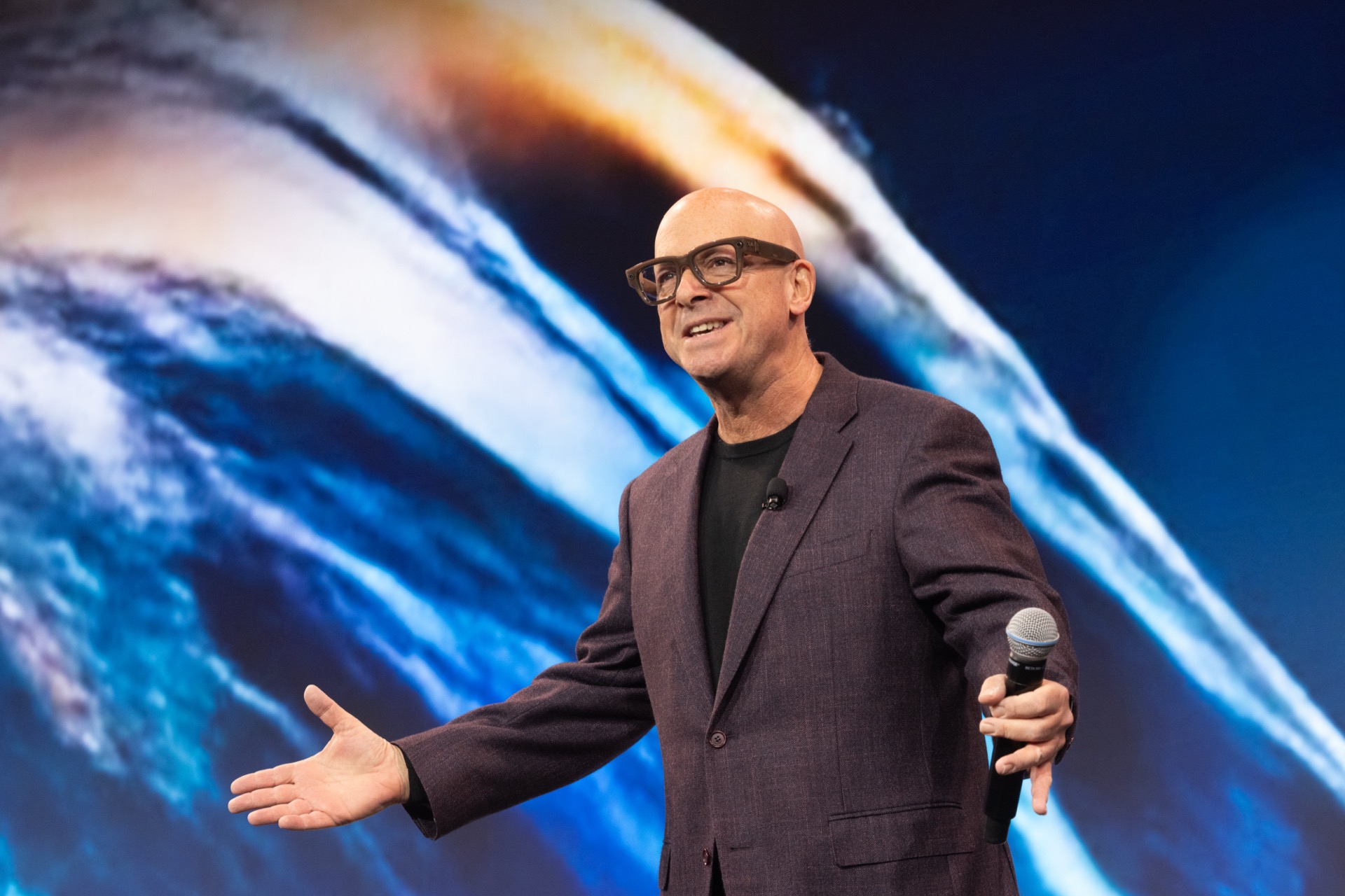Mark Jeffries delivering a keynote on a main stage